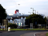 Early on the morning of 24 July 2011, Queen Mary 2 ooms over Southampton Docks